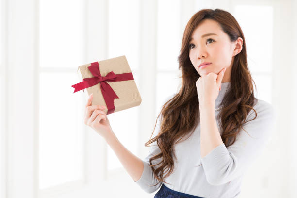 istock young attractive asian woman 1129749019