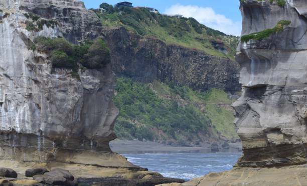 istock Cliff faces Phia beach , New Zealand 1129751355