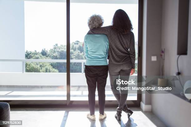 Girl Visiting Grandma Stock Photo - Download Image Now - Parent, Senior Adult, Aging Process