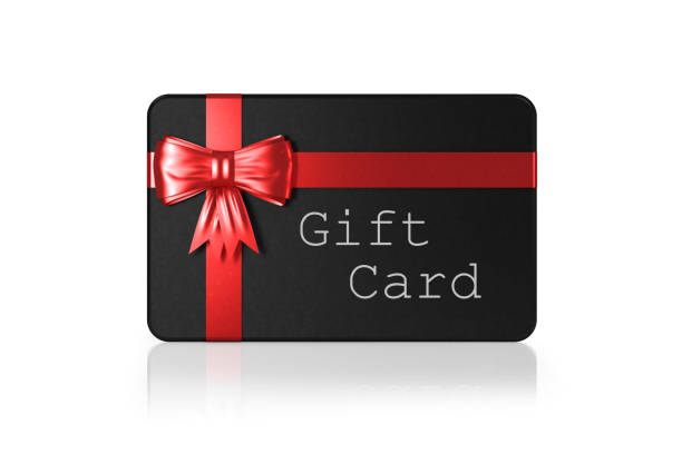 istock Black Color Gift Card And Red Tied Bow Isolated On White With Clipping Path 1129754712