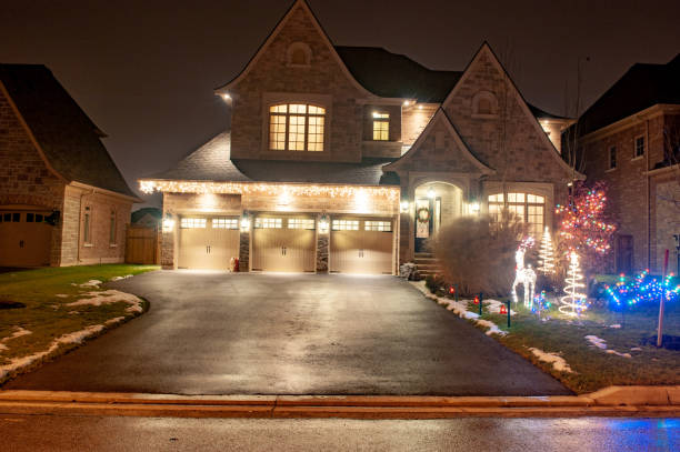 Front porch of a large luxury home at night