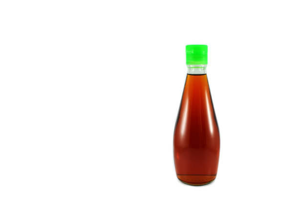 soy sauce in square bowl.
