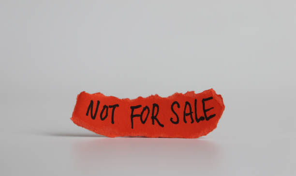 istock ‘NOT FOR SALE’ message on the ripped paper. 1129766573