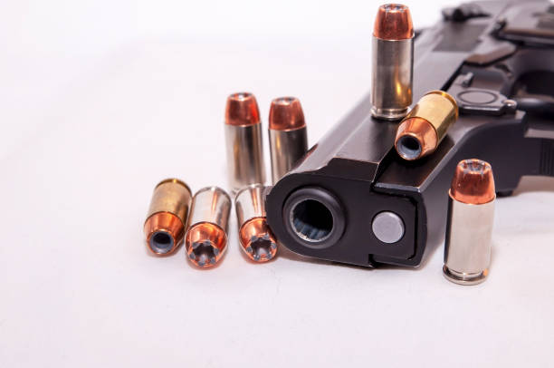 istock A black 40 caliber pistol with eight 40 caliber hollow point bullets 1129768111