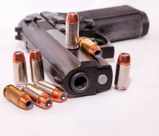 istock A black 40 caliber pistol with eight 40 caliber hollow point bullets 1129768115