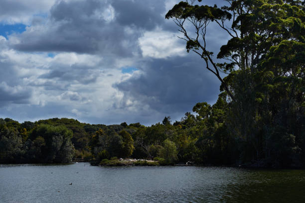 Heavy clouds on summers day, with lake