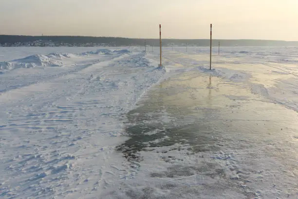 Photo of Ice road,  river crossing on the Ob reservoir, Novosibirsk region, Western Siberia, Russia