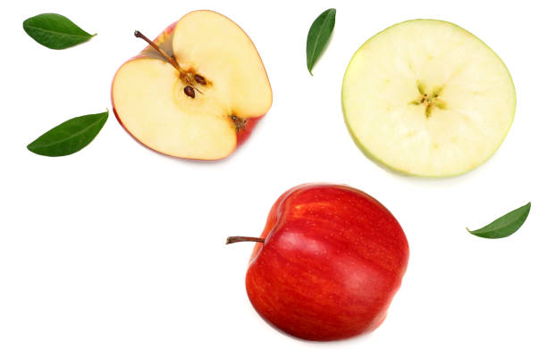 istock red apples with slices isolated on white background. top view 1129781454
