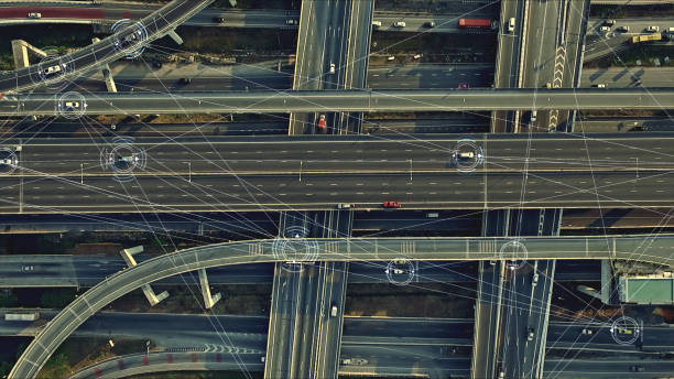istock Futuristic Driverless Cars on the Elevated Expressway 1129781717