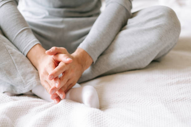 istock morning day coziness man pyjamas bed thinking 1129785784