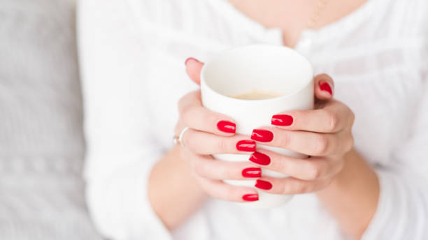 istock coffee break relax woman hold cup latte 1129785801