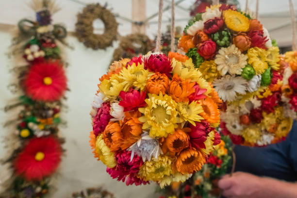 istock Colorful flowery decorations for sale 1129786655