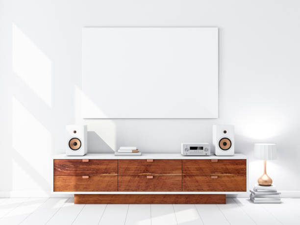 istock Horizontal canvas Mockup hanging on the wall, hi fi micro system on bureau 1129786771
