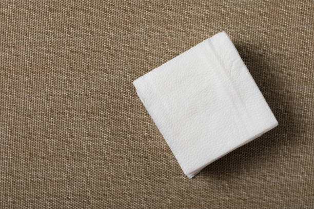 istock Paper napkin on textured background 1129790138