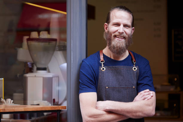 istock Barista portrait in store front. 1129793260