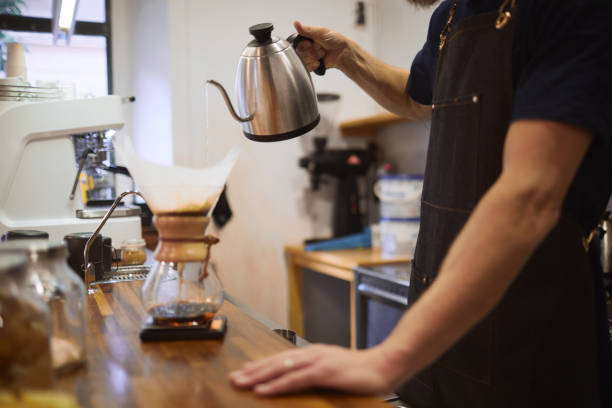 istock Barista making filtered coffee. 1129793261