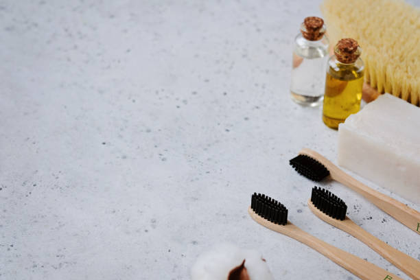 istock Plastic free products and bamboo toothbrush - creative layout on grey background. Eco natural skin care concept. 1129793536