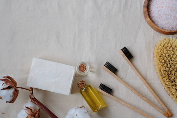 istock Plastic free products and bamboo toothbrush - creative layout on cotton background. Eco natural skin care concept. 1129793627