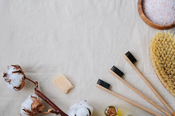 istock Plastic free products and bamboo toothbrush - creative layout on cotton background. Eco natural skin care concept. 1129793651
