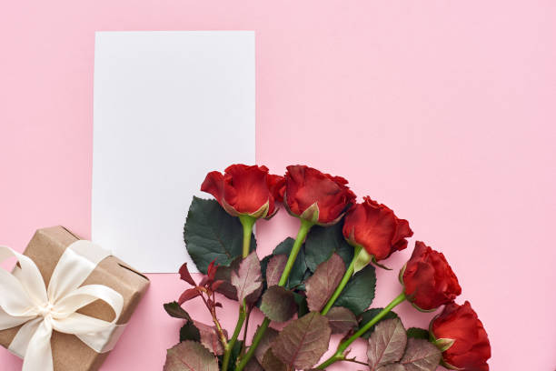 istock Make her happy Gift set includes red roses, homemade gift box and paper note for your love words 1129797499