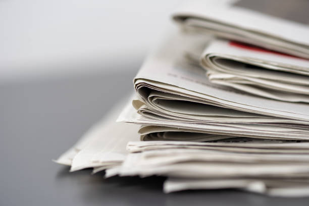 istock Macro shot of a stack of newspapers 1129804921