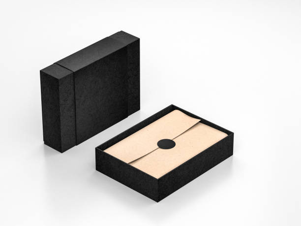 istock Opened Black Box Mockup with kraft wrapping paper and label 1129806022