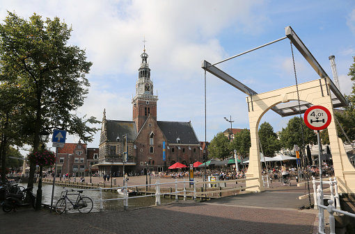 Alkmaar, Netherlands - August 24, 2017: drawbridge and the church in the historic center