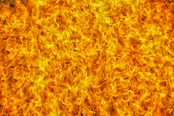 full framed  intense orange fire flames texture - forest fire power actions nature imagens e fotografias de stock