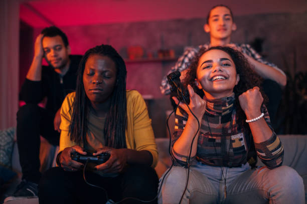 istock Friends playing video games 1129812311
