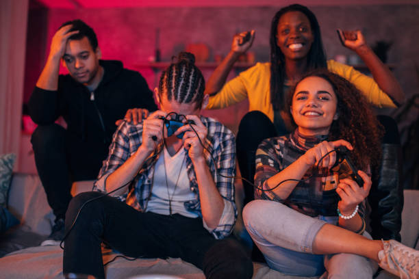 istock Friends playing video games 1129812382