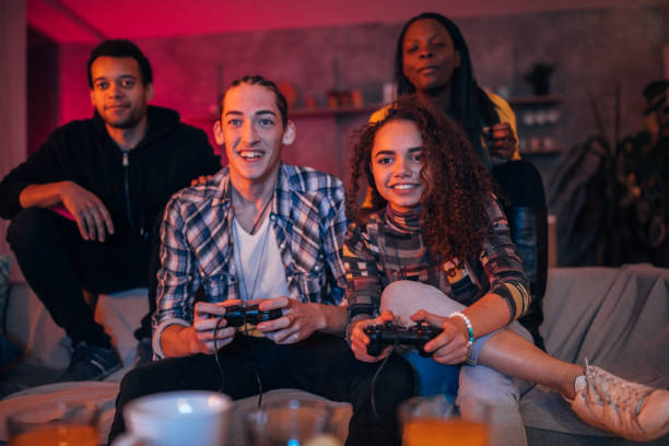 istock Friends playing video games 1129812587