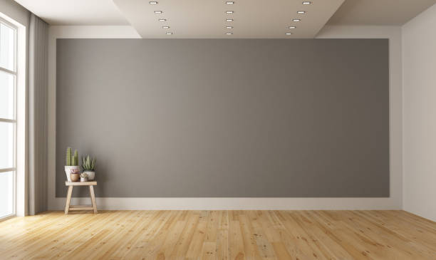 leeren minimalistischen raum mit grauen wand im hintergrund - wohnzimmer stock-fotos und bilder