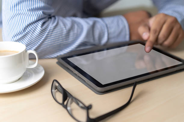 istock Mockup of business man using  laptop screen for your advertising text message 1129813893