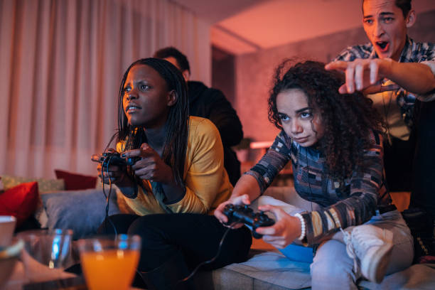 istock Friends playing video games 1129814264
