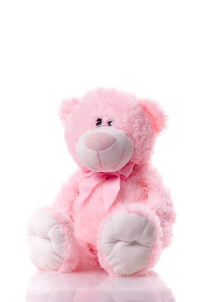 istock Lovely cute pink teddy bear isolated on white background. 1129814756