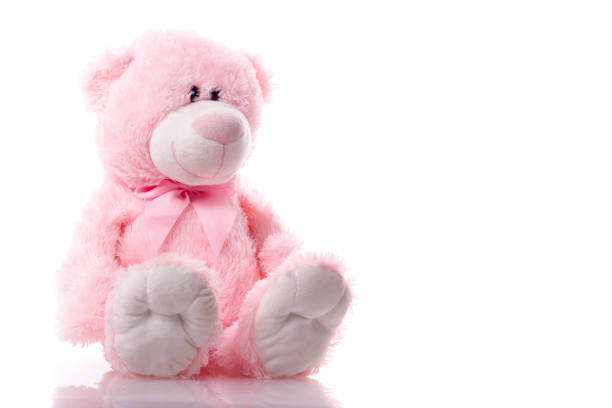 istock Lovely cute pink teddy bear isolated on white background. 1129814768