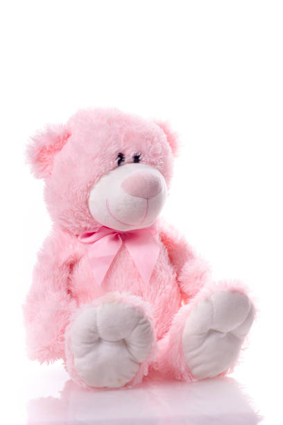 istock Lovely cute pink teddy bear isolated on white background. 1129814795
