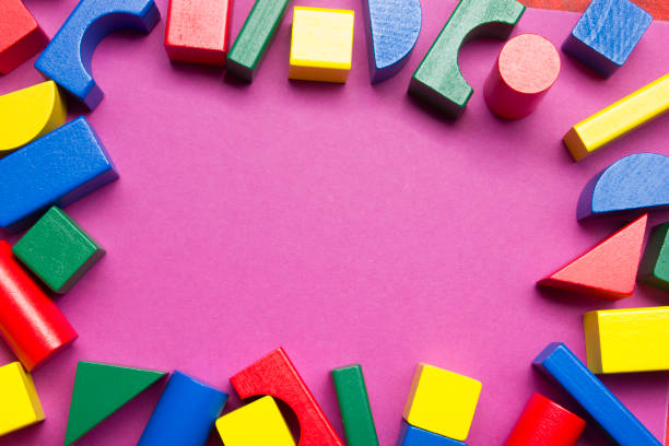 istock Kids educational developing toys frame on white background. Top view. Flat lay. Copy space for text 1129815720