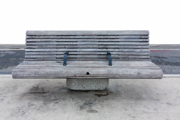istock empty wooden park bench isolated on white 1129818658