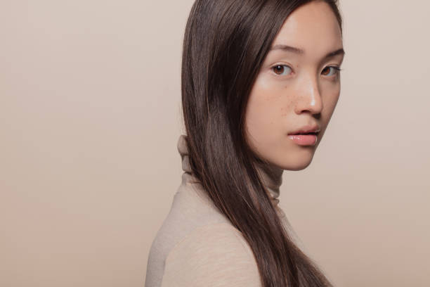 istock Beautiful woman with long hair 1129820532
