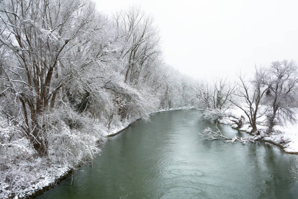 Canal captured during snowfall in winter