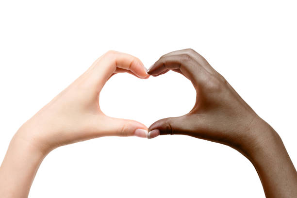 istock Female hands show heart on white background. 1129821631