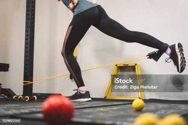 Woman Doing Exercise For Glutes Stock Photo - Download Image Now - Active Lifestyle, Adult, Athlete