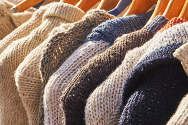 sweater Hand-knitted sweaters from Madeira oberteil stock pictures, royalty-free photos & images
