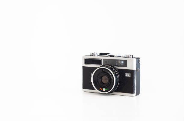 istock Old compact film camera de branded rangefinder isolated against pure white front view 1129824344