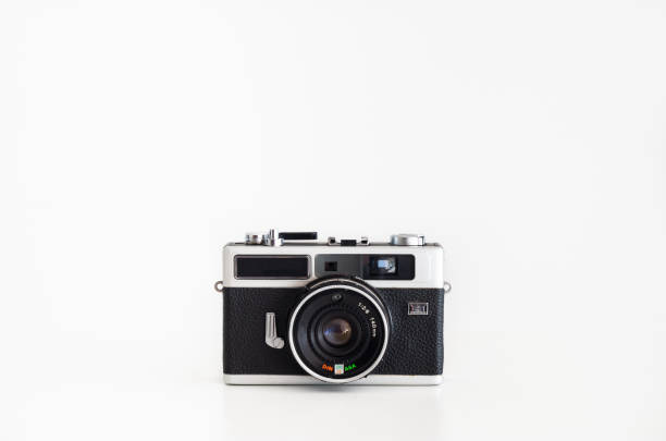 istock Old compact film camera de branded rangefinder isolated against pure white front view 1129824348