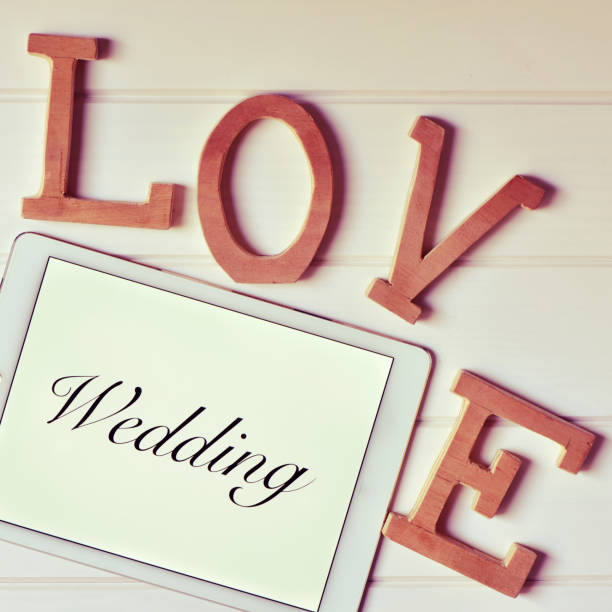 istock words love and wedding, filtered 1129825019