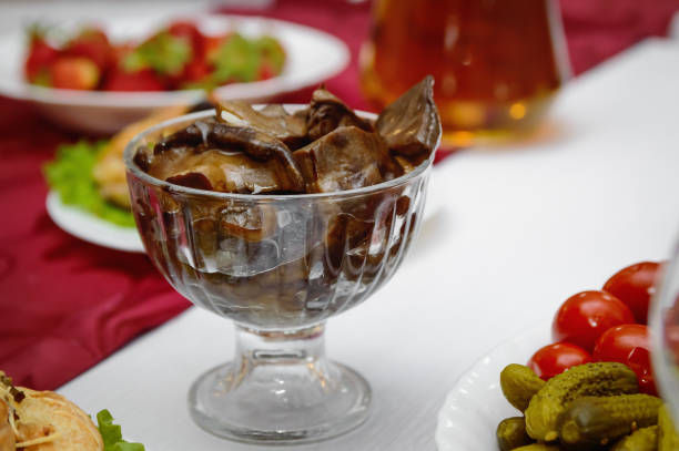 istock Marinated mushrooms, cut into pieces. Festive banquet. 1129827573