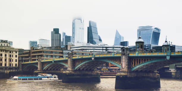 istock Downtown view of London from Thames River and Southwark Bridge 1129829459