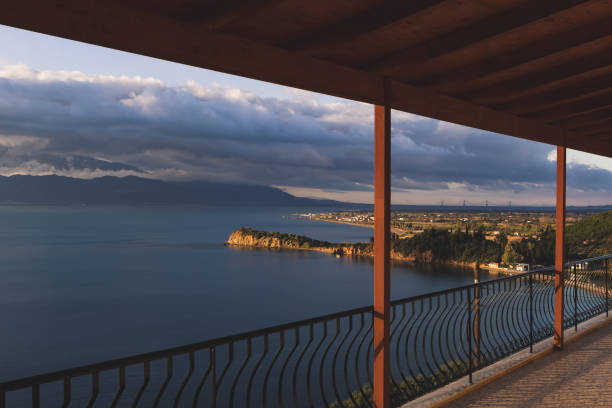 istock Sea view from balcony, mountains in background. 1129830067